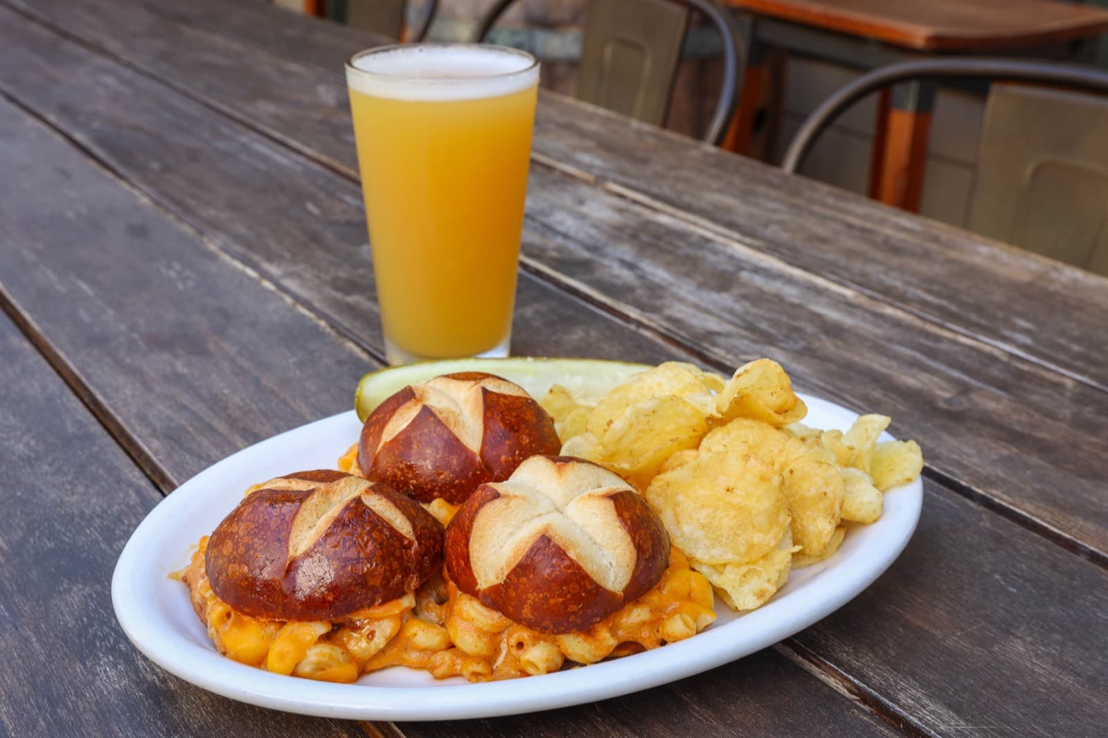 Pretzel bun sliders stuffed with Pot O' Gold beer cheese mac